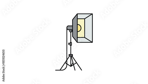 Studio lighting equipment on a tripod stand.