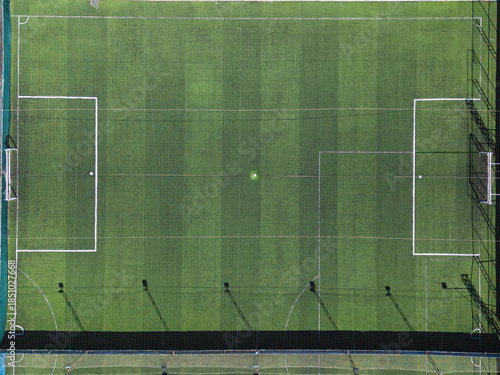 Top-Down Aerial View of a Single Green Artificial Turf Soccer Field, Highlighting Goal Boxes and White Lines