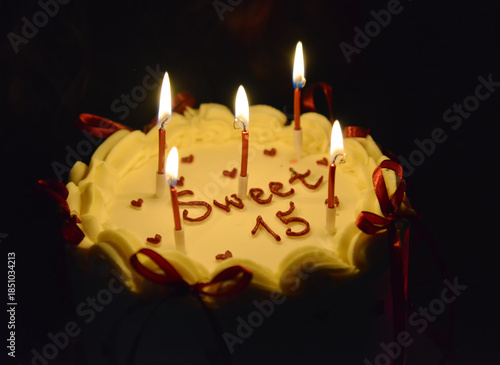 Sweet Fifteen Birthday Cake with Candles and Cream Decoration