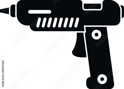 Glue gun creating adhesive bond for crafting and repair projects