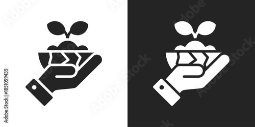Hand Planting Icon In Black And White Glyph Style