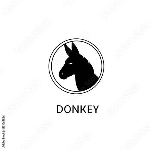 ​Donkey Head Silhouette Logo in Circle. Classic Mule Emblem Vector Illustration. Solid Shape Badge.