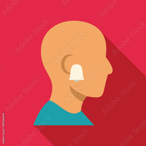 Man face in profile wearing a cochlear implant for hearing impairment and deafness