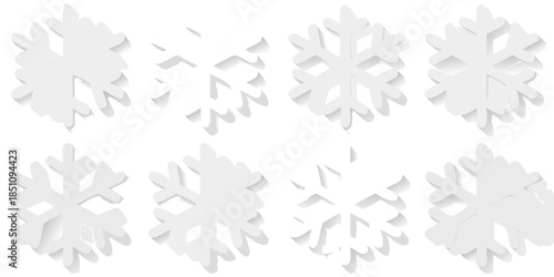 Abstract arrangement of white geometric shapes resembling snowflakes on a dark background