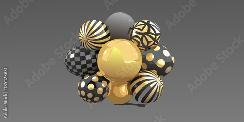 A cluster of decorative spheres in black gold and white patterns