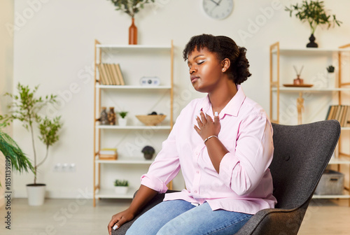 Fotografie Woman finds peace of mind and lives in harmony with herself