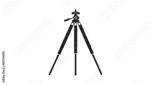 Black camera tripod isolated on a white background.