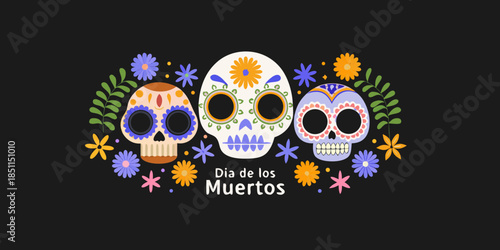 Colorful sugar skulls and floral decorations for d a de los muertos