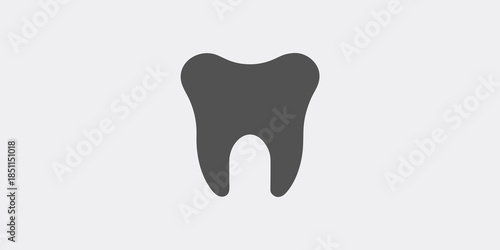 Simple graphic illustration of a single dark gray tooth on a light background