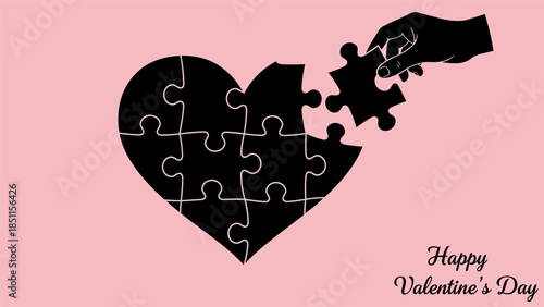 Heart-shaped puzzle with a hand placing the last piece, symbolizing love and connection on Valentine's Day.