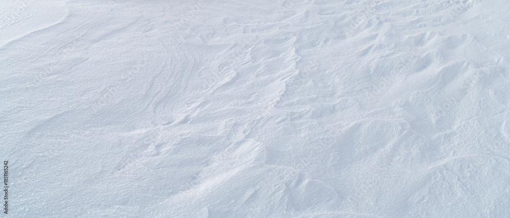 Obraz premium Snow abstract textured background with rough texture for design page template banner wallpaper or greeting card.