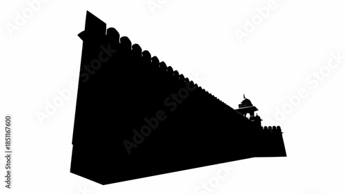 Silhouette of a grand historical fortress wall with intricate details.