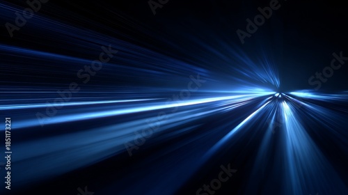 Speeding Through the Night Blue Light Trails on a Dark Highway.