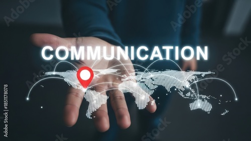 Global Network Connectivity: Businessman hand holding glowing world map with location pin for international communication logistics
