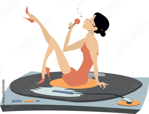 Romantic young woman with microphone sings sitting on the long play record