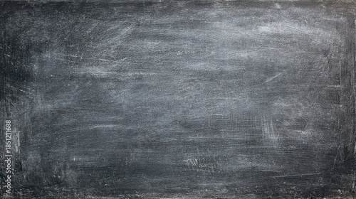 A grungy dark grey texture background with subtle white chalk dust and scratch marks providing a rustic feel