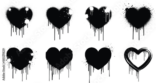 Set of black spray painted graffiti heart symbols with paint drips and splatters isolated on white background for urban street art designs