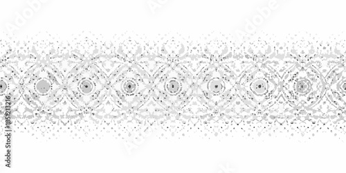 Intricate grayscale pattern featuring repeating circular and floral motifs