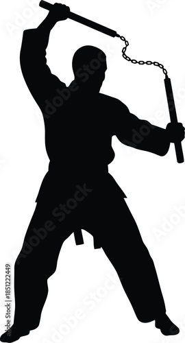 Dynamic martial arts silhouette demonstrating nunchaku technique with precision