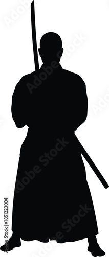 A striking silhouette of a martial artist in traditional attire, holding a katana with a powerful stance