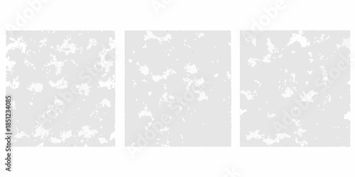 Abstract triptych displaying a textured mottled gray and white pattern