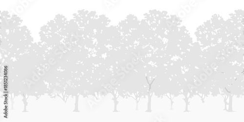 A serene landscape featuring a dense row of silhouetted trees against a white backdrop