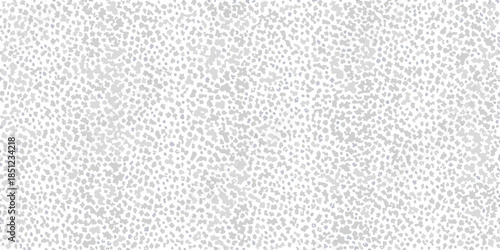 A grayscale speckled texture resembling foam or a grainy surface