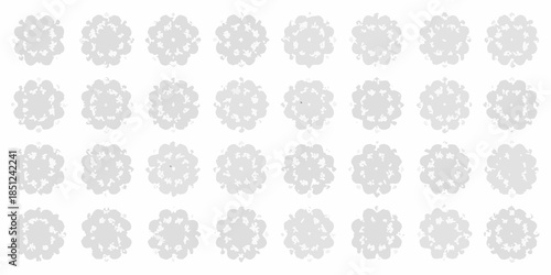 A repeating pattern of delicate gray floral or rosette shapes on white