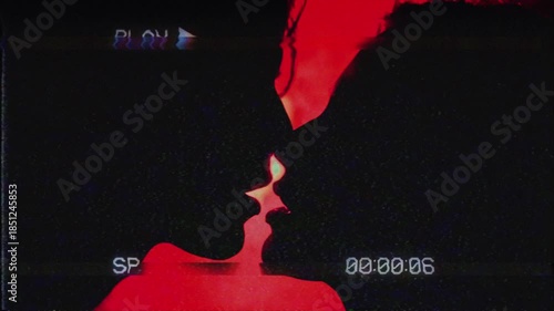 Heterosexual couple expresses their love for each other with a gentle kiss on the lips on the stage at the theater.