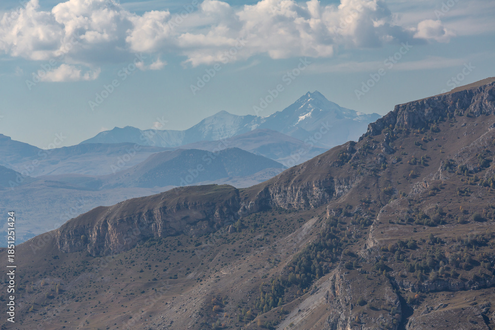 Fototapeta premium Panoramic view of mountain ridges in North Caucasus