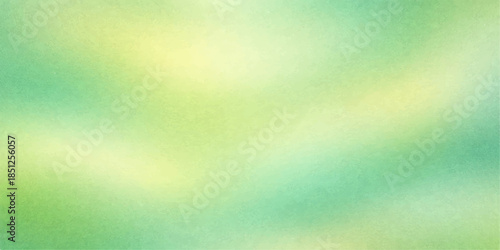 Abstract green and colorful watercolor background featuring a vintage grunge paper texture with light blue paint patterns on an old textured canvas wall backdrop for artistic wallpaper design