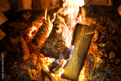 A bonfire burning in the night. A close up of burning bonfire flames
