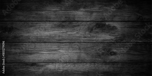 A dark grunge wood texture features a rough brown timber plank pattern with a natural grain surface on an old weathered hardwood board wall backdrop