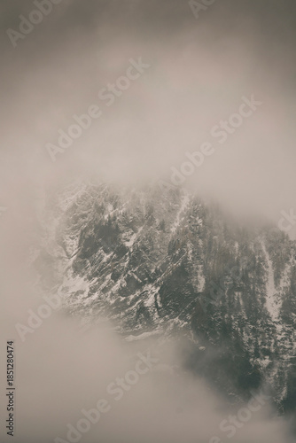 Panoramic view of the Mont Blanc massif with fog, Chamonix village, Switzerland