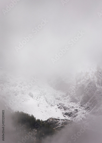 Panoramic view of the Mont Blanc massif with fog, Chamonix village, Switzerland II