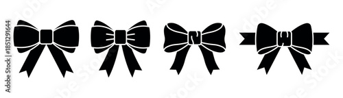 Collection of four black bow tie icons on white background