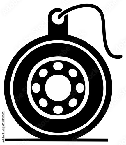 Black tire ornament with metal rim and hanging loop on a simple line