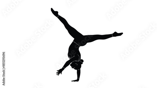 Silhouette of a person doing a handstand with long hair flowing