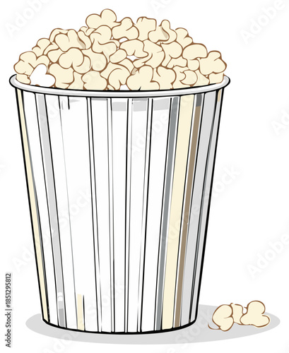 Classic striped bucket full of fluffy popcorn and kernels scattered on the floor