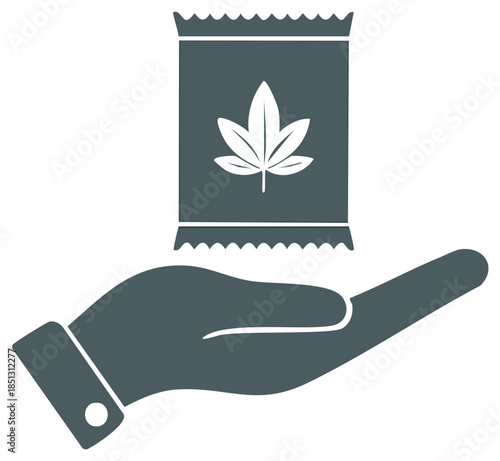 Hand holding a pack with a cannabis leaf, promoting sustainable packaging for a natural product.