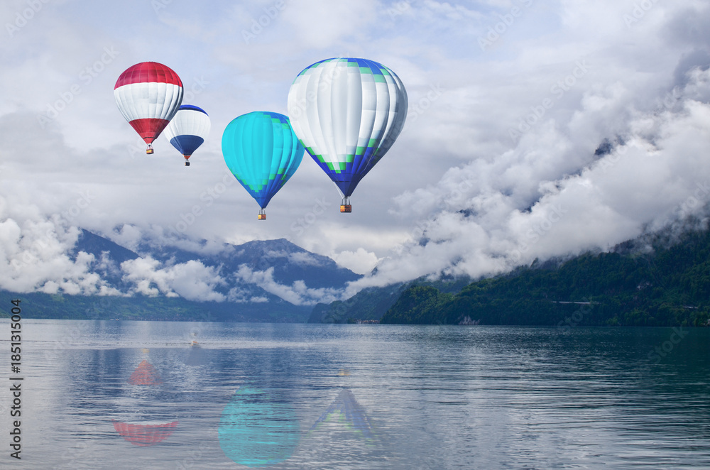 Fototapeta premium Colorful hot air balloons flying above sea