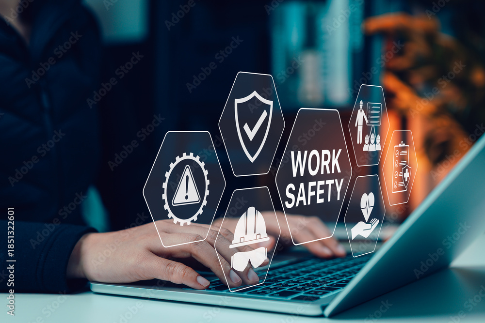 Naklejka premium Woman using laptop with interface showing work safety, protection, training, risk management, compliance, personal protective equipment (PPE), and healthcare icons for workplace safety concept.