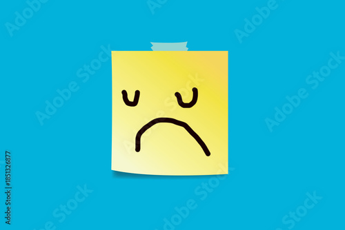 Sad faces drawn on sticky notes.