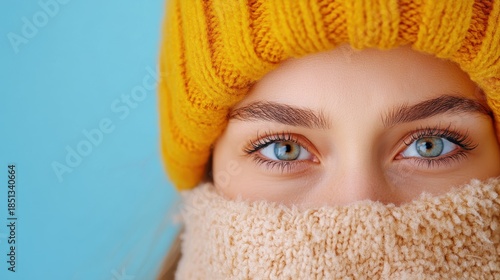 Young woman battling flu symptoms in a cozy winter setting