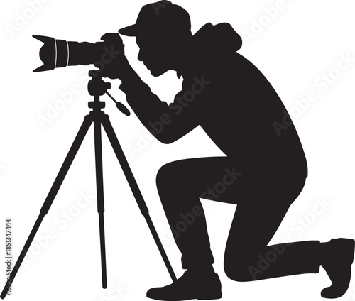 Silhouette of a kneeling photographer with a camera on a tripod vector illustration