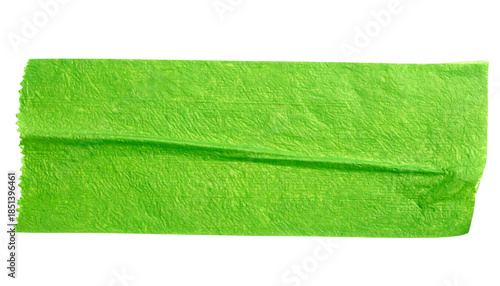 Close-up of a rectangular strip of green adhesive masking tape with uneven edges
