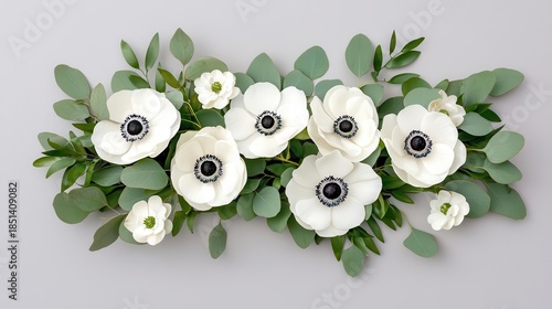 Elegant arrangement of white anemones and eucalyptus, isolated for a sophisticated wedding style