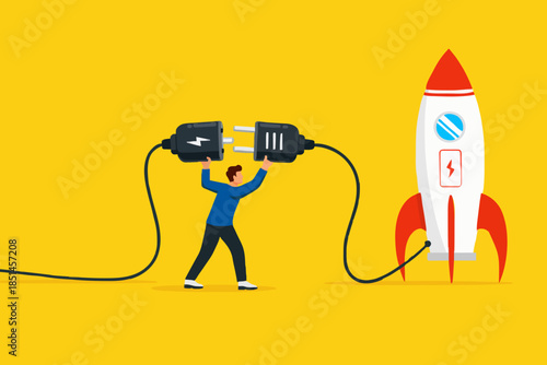 prepare start up business to achieve goal or target, Start up target of business development process, businessman connect plug with rocket to power socket to charge rocket for launching new product