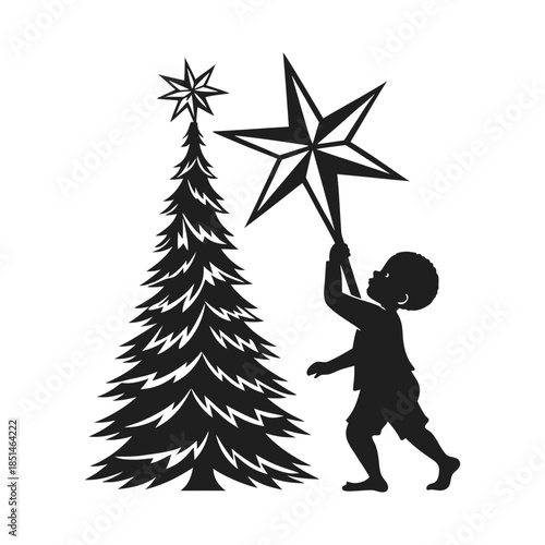 Child placing star on christmas tree