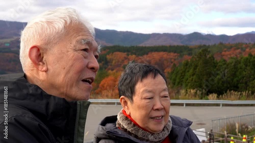 Happy senior couple travel in Autumn Winter Japan fun retirement trip experience